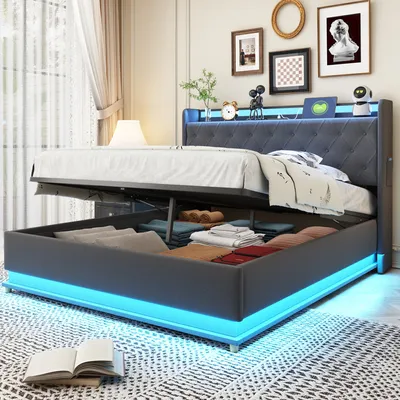 A modern upholstered bed with storage, illuminated by blue LED lights, is shown in a bedroom setting.