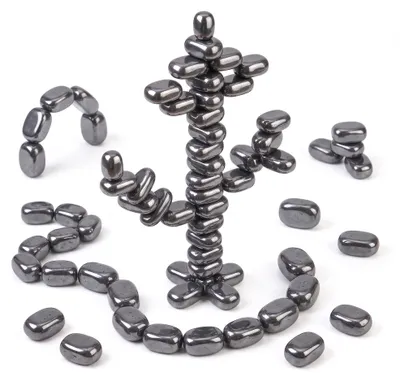 Imagen del producto de Piedras magnéticas 50 piezas – set de 2 cajas (30 + 20), juego de estrategia magnético para niños a partir de 8 años y adultos, Imagen generada por IA