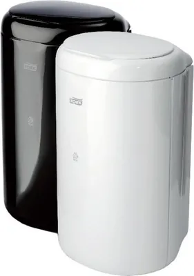 Two Tork waste bins, one black and one white, are shown side-by-side against a white background.