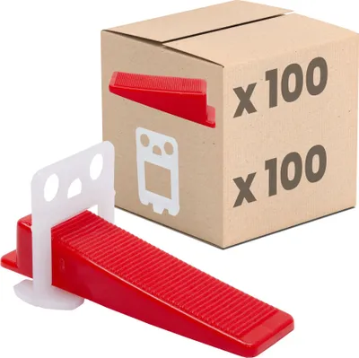 A box of tile leveling system wedges and clips.