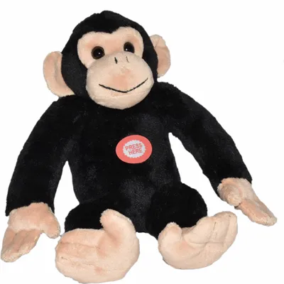 A plush toy chimpanzee sitting on a white background.