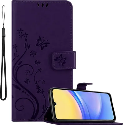 A purple flip-style phone case with a floral design is shown open, revealing a smartphone inside. A black wrist strap is attached to the case.