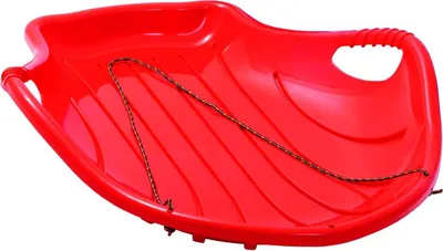 A red plastic snow sled with a rope attached, shown from a slightly elevated side angle against a white background.