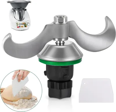 A close-up of a food processor blade attachment, with a smaller inset image showing dough being scraped.