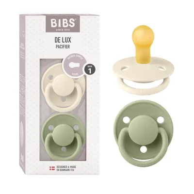 Image de Sucettes BIBS De Lux, lot de 2, sans BPA, tétine en forme de cerise. Caoutchouc naturel / latex, fabriquées au Danemark. Taille 1 (0-6 mois), ivoire / sauge