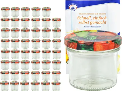A set of small glass jars with decorative lids and a recipe book.