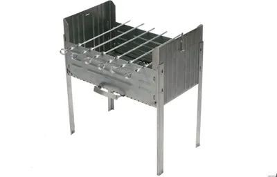 A metal camping grill with skewers on a white background.