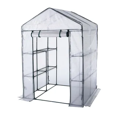 A transparent greenhouse with shelves on a white background.