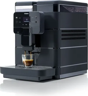 A black Saeco coffee machine is shown on a white background, with espresso being brewed into a glass cup.