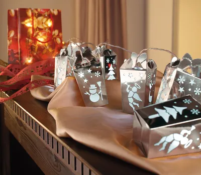 Produktbild von LED Lichterkette warmweiß Motiv Geschenke silber 10 LED´s batteriebetrieben