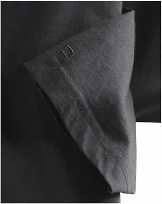 A close-up view of the sleeve of a black t-shirt, showing the cuff detail.