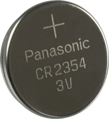 A close-up, studio shot of a silver coin-cell battery.