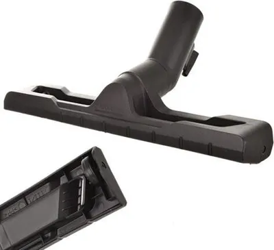 A black vacuum cleaner floor nozzle and a separate part of it are shown against a white background.