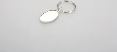Produktbild von Schlüsselanhänger oval L 8,0 cm Durchmesser 2,5 x 4,0 cm versilbert