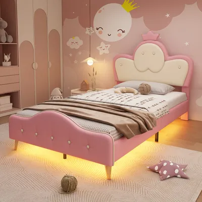 A child's bedroom with a pink bed and themed decor.