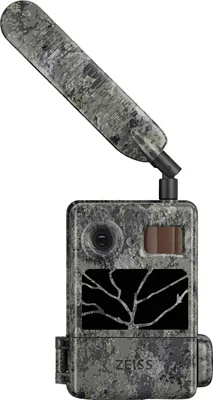 A camouflage-patterned trail camera with an extended antenna, shown against a white background.