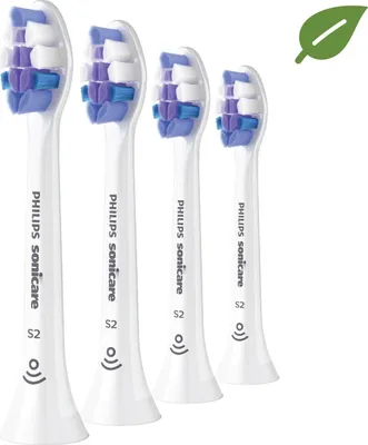 Four Philips Sonicare S2 Sensitive toothbrush heads are displayed against a white background. A green leaf icon is in the upper right corner.