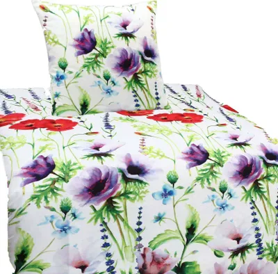 A close-up view of a floral patterned duvet cover and pillowcase set.