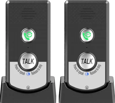 Two wireless intercom units are shown side-by-side on their charging bases.