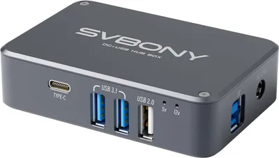 A gray USB hub box with multiple ports and branding.
