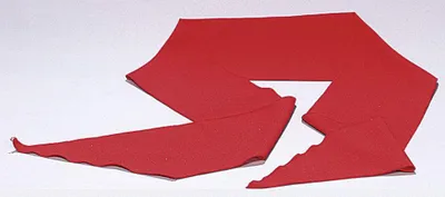 A red sash or scarf is laid out on a white background.