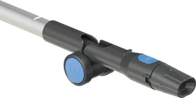 A close-up shot of a vacuum cleaner extension wand with a blue wheel and button.