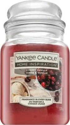A Yankee Candle Home Inspiration Cherry Vanilla scented candle in a glass jar with a lid.