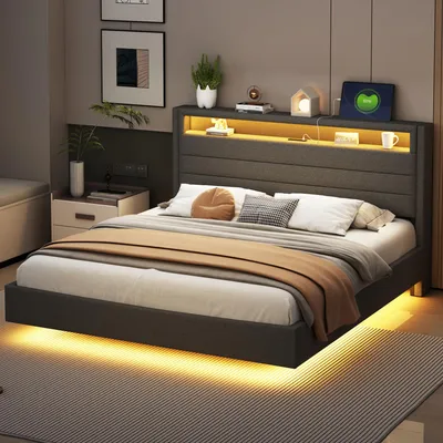 A modern bedroom with a bed featuring LED lighting and a headboard with storage.