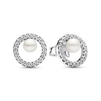 A pair of silver stud earrings with pearls and small diamonds, presented on a white background.