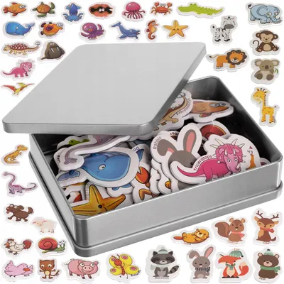 A metal tin filled with various animal-shaped magnets, with the lid open.