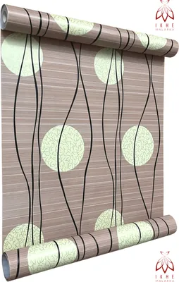A roll of wallpaper with a brown background and a pattern of green circles and black wavy lines.