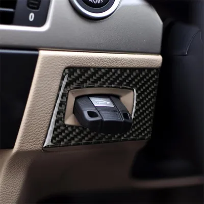 Productafbeelding van Koolstofvezel interieurstrip met aan/uit-schakelaar voor BMW E90 / E92, modeljaren 2005-2012