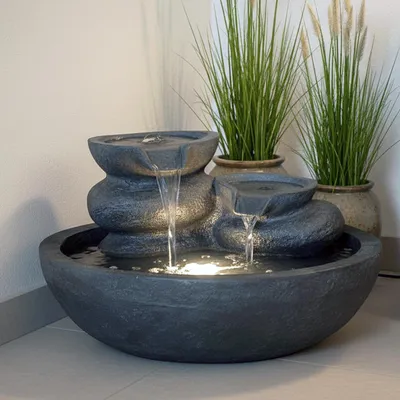 Produktbild von Dekorativer LED Zimmerbrunnen & Gartenbrunnen TP3005 Polyresin Wasserspiel mit warmweißem Licht für Innen & Außen
