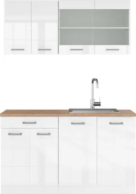 A white kitchen cabinet set with a wooden countertop and a sink with a faucet.