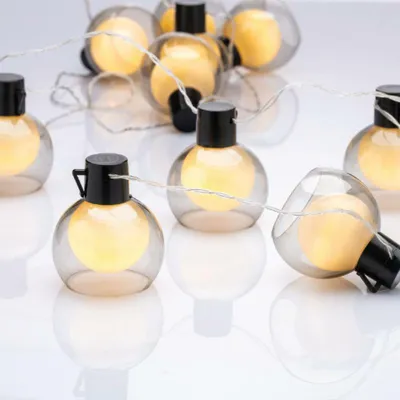 Imagen del producto de Guirnalda de luces LED solares ACA para decoración navideña, con bolas, 11 LEDs, luz blanca cálida, IP20, 2,3 m + 50 cm, X09101320