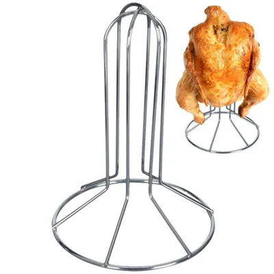 A metal chicken roaster stand is shown next to a roasted chicken on a similar stand.