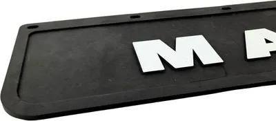 A close-up shot of a black license plate frame with white letters spelling 'MAP' partially visible.
