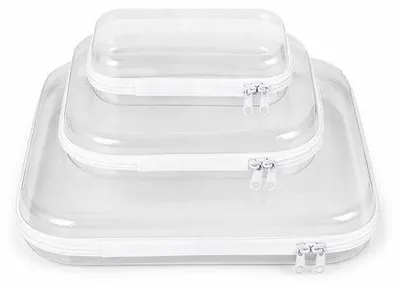 Produktbild von Drei tragbare Reisekoffer - Transparents - Kosmetiktaschen mit Reißverschluss - Drei verschiedene Größen - Maximal 35x30x5cm - Für Kosmetik, Büroartikel, Dokumente und Toilettenartikel - Weiss
