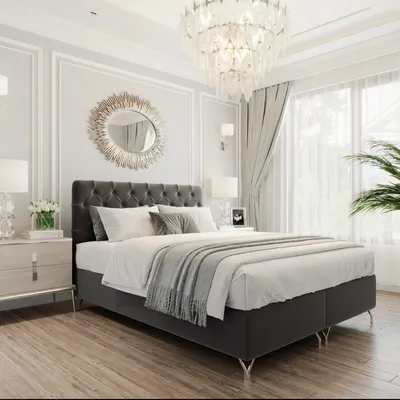 A luxurious bedroom setting featuring a large bed, nightstands, and decorative elements.