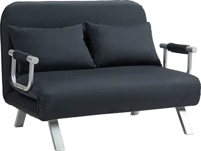 A dark gray sofa bed with two throw pillows and silver armrests and legs, shown from the front on a white background.