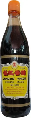 A bottle of Chinkiang vinegar on a white background.