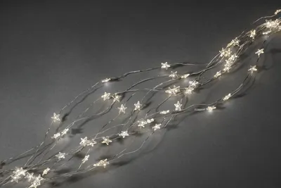 Produktbild von Konstsmide - LED Sternenlametta 10 Stränge à 9 Dioden , 90 warm weiße Dioden, 12V Innentrafo, silberfarbener Draht; 6370-190