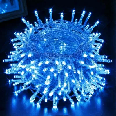 A close-up, coiled bundle of blue LED string lights.