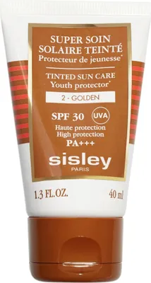 A tube of Sisley tinted sun care product.