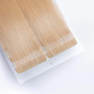 Image de Extensions adhésives invisibles en cheveux naturels 40 cm 25 g – Extension de cheveux n° 24 Blond doré