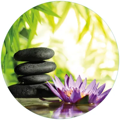 Produktbild von Wallario Premium Glasbild, freischwebende Optik, kräftige Farben, rund 50cm Durchmesser, Motiv Steinstapel in schwarz mit Blumenblüte in lila