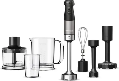 A set of kitchen appliances including a hand blender, measuring jug, and attachments, displayed against a white background.