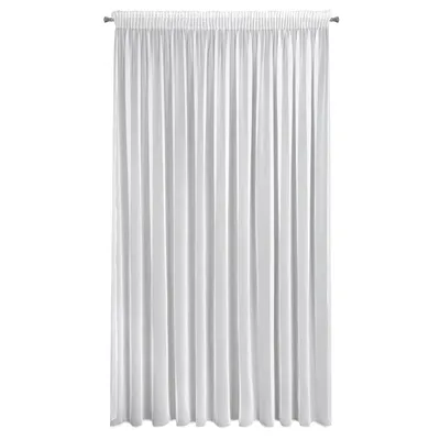 A white curtain hanging from a rod.