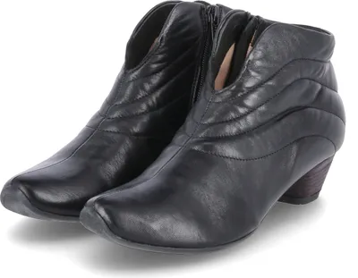 A pair of black leather ankle boots with a low heel, presented on a white background.