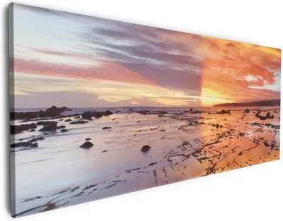 Produktbild von Wallario Premium Leinwandbild Wattwanderung am Meer bei Sonnenuntergang in Größe 80 x 200 cm